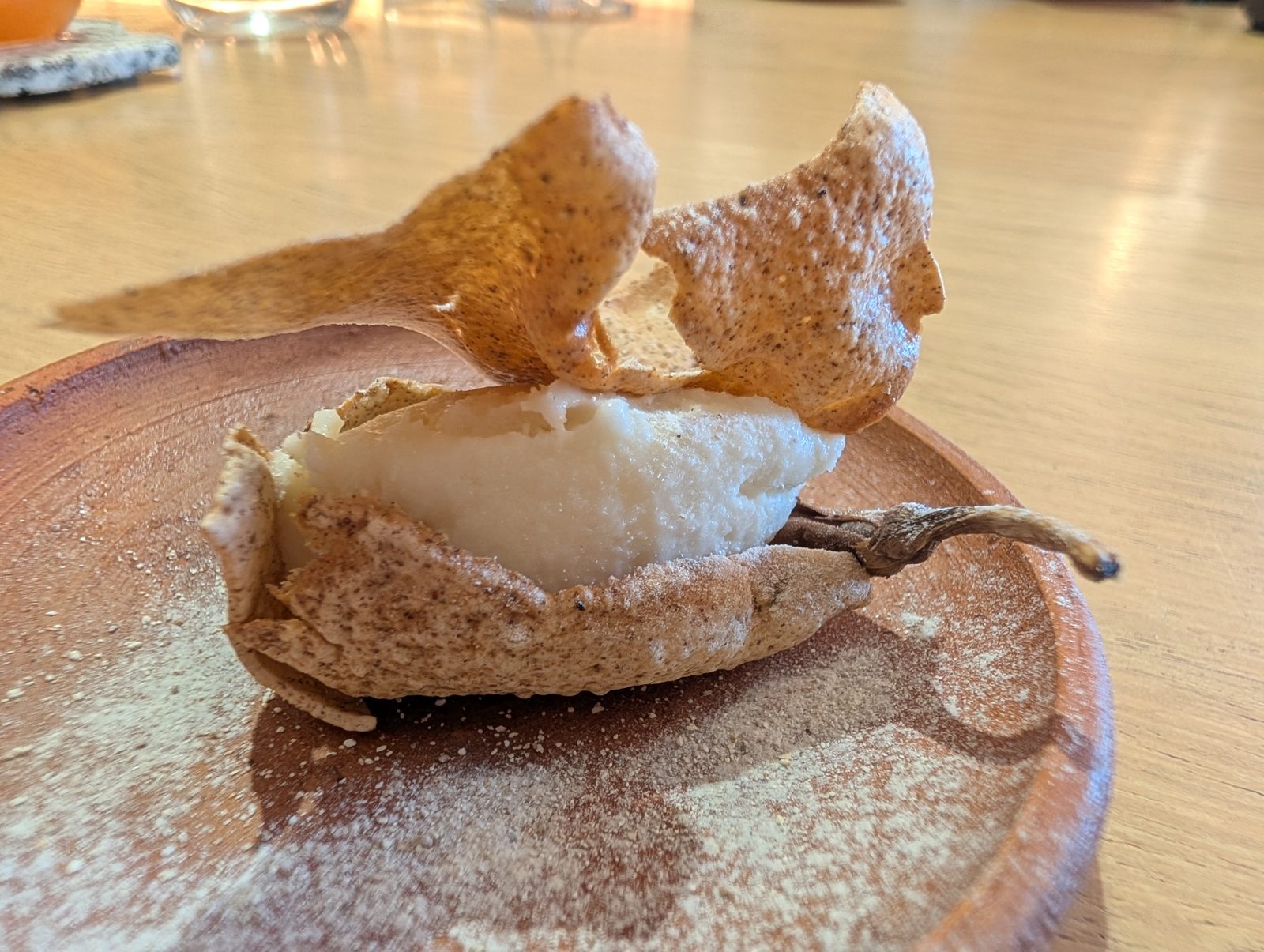 A crisp over cream, dusted.