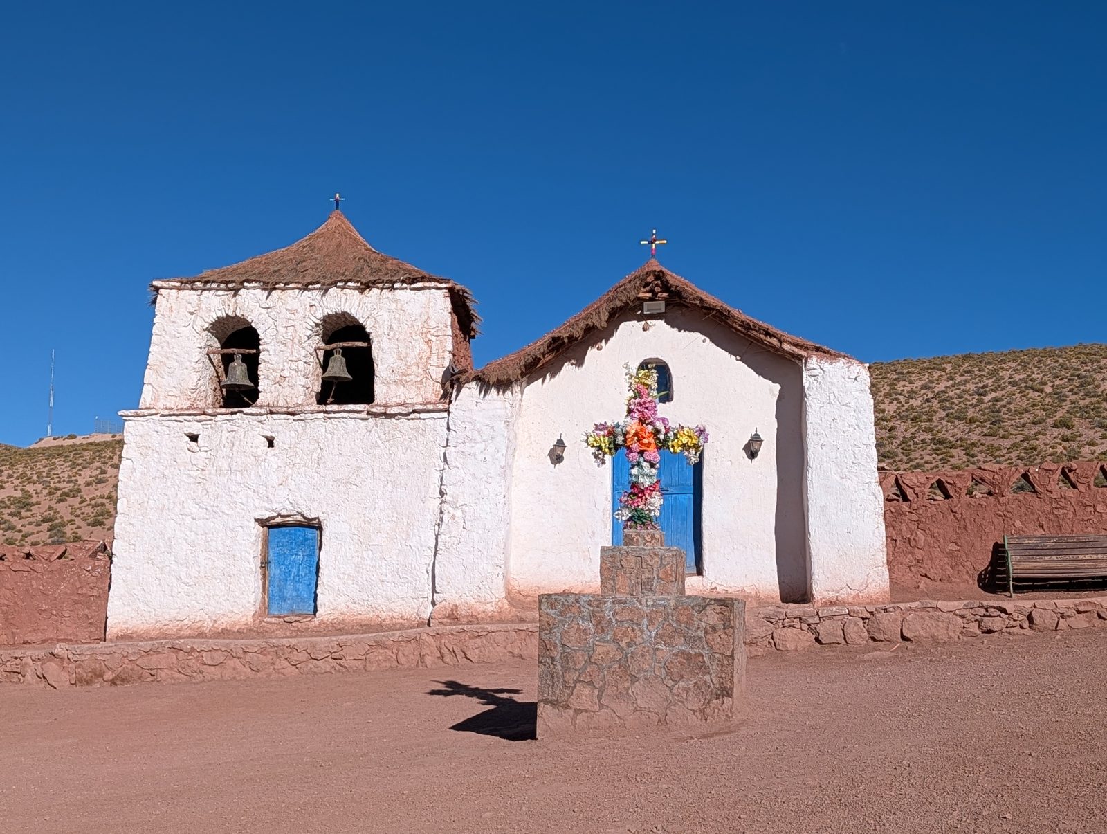 The church at Machuca. Adobe, cactus-wood doors, straw roof.