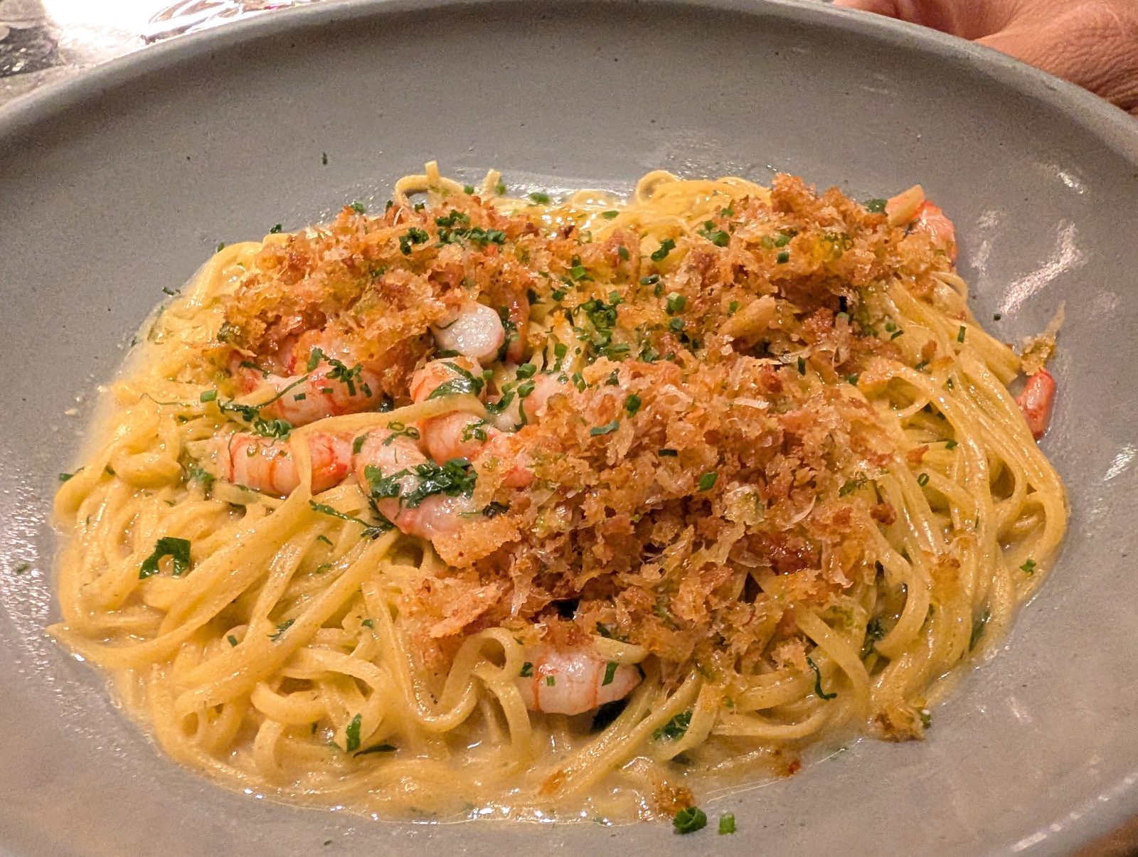 Pasta with shrimp and toasted crumbs.