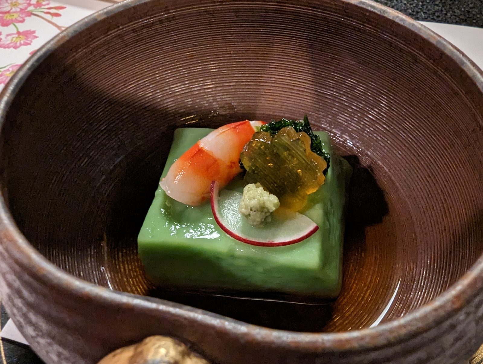 Hanasaki Manjiro. Green tofu with a shrimp on top.