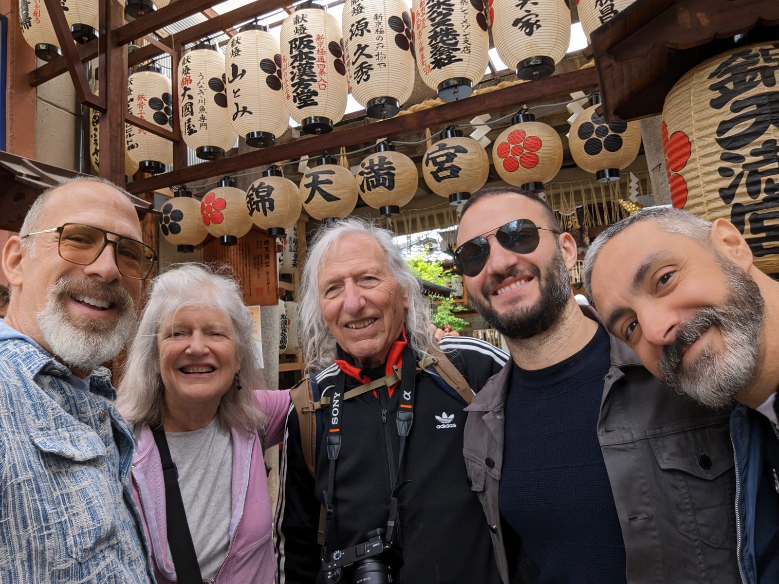 All five of us at Nishiki Tenmangu, the shrine at the end of the market, under its lanterns.